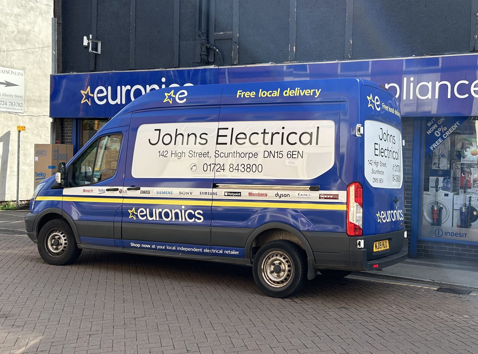 The Johns Electrical van parked outside the shop in Scunthorpe.